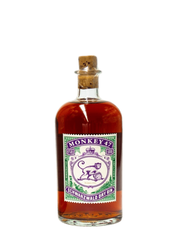 A compact, apothecary-style 500ml bottle of Monkey 47 'Barrel Cut' Dry Gin, made of dark amber glass. The label has a vintage design with intricate detailing in cream, gold, and deep burgundy tones. It features the signature monkey illustration holding a ring, framed in an ornate border with the name 'Monkey 47 Schwarzwald Dry Gin' and 'Barrel Cut' prominently displayed. The gin’s aged nature is hinted at through warm color tones and barrel imagery. The bottle is sealed with a natural cork and a wax-dipped 